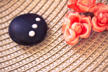 natural beauty care and wellbeing, spa stones and flowersの写真素材