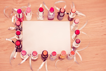 makeup and cosmetics: set of lipsticks with white cardの写真素材