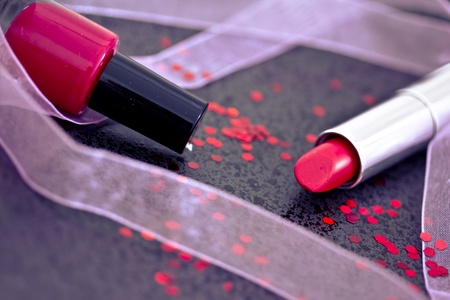 makeup shot of lipsticks and nail polishの写真素材