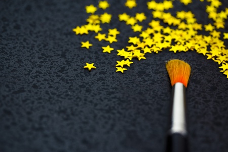 brush creating stars on black: uniqueness, talentの写真素材