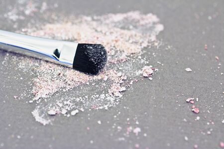 macro of eyeshadow powder and brushの写真素材