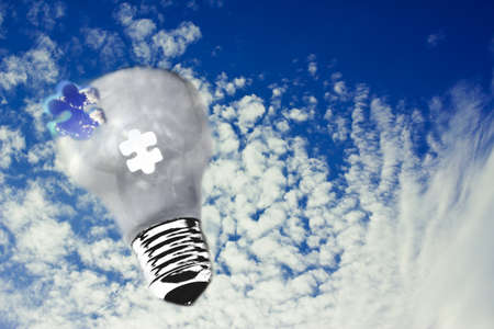 beautiful sky and lightbulb, concept of ecologyの写真素材