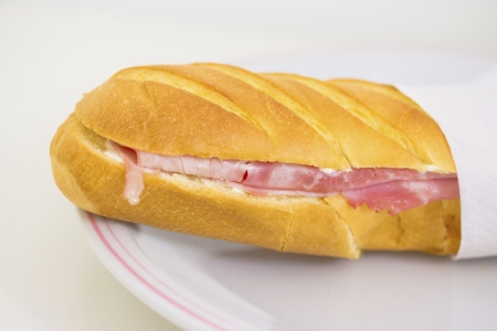 baguette bread with ham and cheese for a snackの写真素材