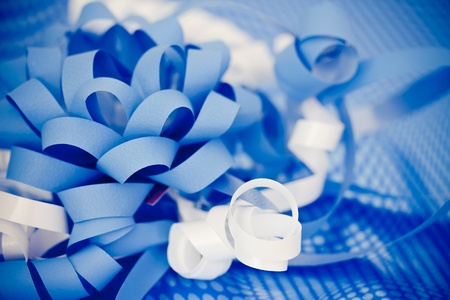 macro of a present beautifully wrapped in blueの写真素材