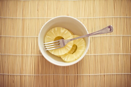 tropical pinapple and bamboo table clothの写真素材
