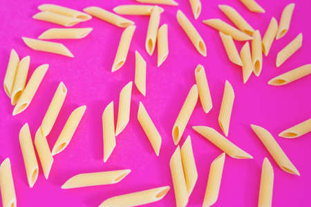 macro shot of Italian pasta on pinkの写真素材