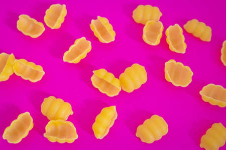 macro shot of Italian pasta on pinkの写真素材