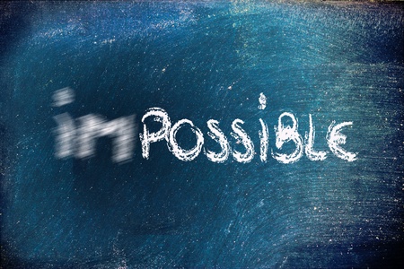 impossible becomes possible, writing on blackboardの写真素材