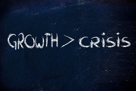 metaphor design on blackboard, crisis vs growthの写真素材