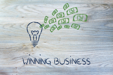 successful profitable idea, lightbulb with money explosionの写真素材
