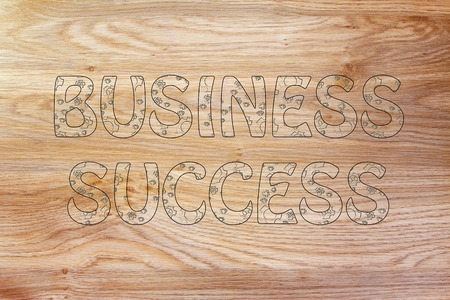 business success writing, glowing gearwheels to symbolize a brilliant mechanismの写真素材