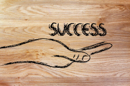 hand holding the writing success, grab your successの写真素材