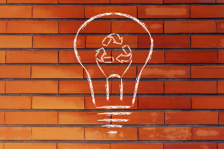 renewable energy concept: lightbulb with recycle sign as filamentの写真素材