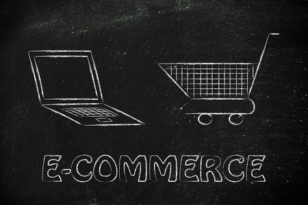 laptop computer and shopping cart, concept of e-commerce and online shoppingの写真素材