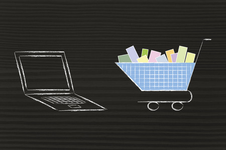 laptop computer and shopping cart, concept of e-commerce and online shoppingの写真素材