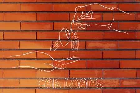 hands giving and taking car keys with remote, concept of renting or buying a new carの写真素材