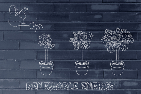 Renewable energy: watering can making a gearwheel mechanism tree grow biggerの写真素材