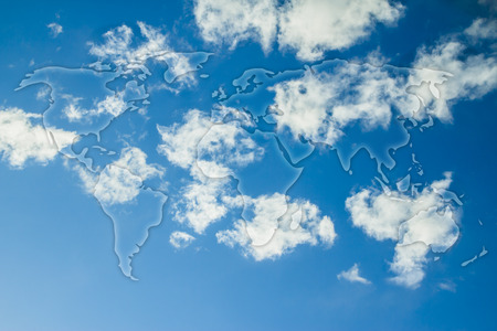 semi transparent glowing overlay creating the map of the world above the skkyの写真素材