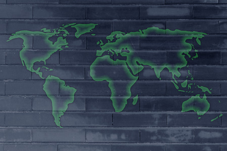 wall texture with glowing world map silhouetteの写真素材