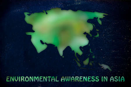 environmental awareness throughout the world: illustration with map of asia made of green leaves...