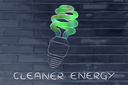 ecological low consumption lightbulb with blurred green fill, concept of renewable energyの写真素材