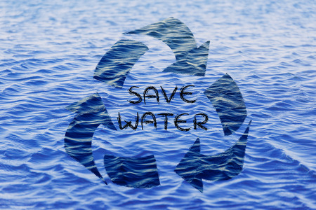 saving water and caring about the environment: recycle symbol with sea patternの写真素材