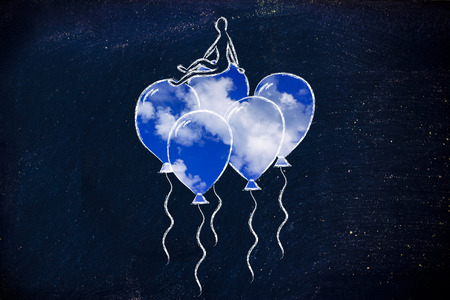 win over stress and anxiety, metaphor of person flying on balloons with sky fillの写真素材