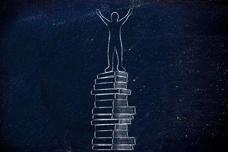 education and school goals: happy accomplished person on top of pile of booksの写真素材