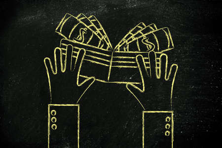concept of saving and spending money: hands holding a wallet with cash