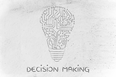 decision making: electronic circuits creating the shape of a lightbulbの写真素材