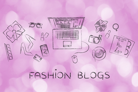 fashion blogs: desk with mixed fashion & beauty objects and personal blog website on laptop's screenの写真素材
