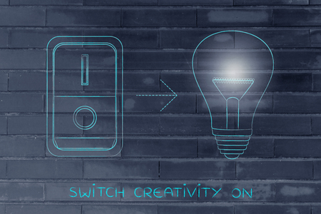 idea lightbulb with switch turned on and light flare, concept of activating solutions or imaginationの写真素材