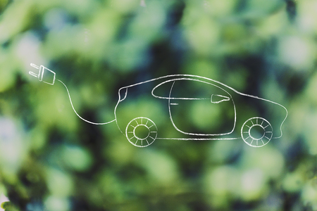 concept of electric and hybrid cars: vehicle with big funny plug to recharge itの写真素材