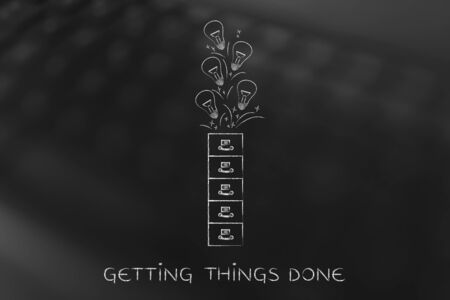 organize your ideas: archive with lightbulbs flying into or out of itの写真素材