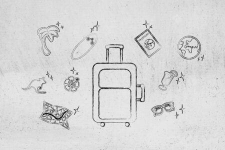 holiday planning and travel wishlist: luggage surrounded by travel iconsの写真素材