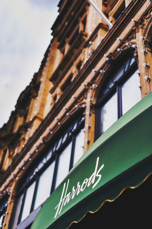 LONDON, UK - August 15, 2014: detail of the entrance of the historical Harrods department store in central Londonのeditorial素材