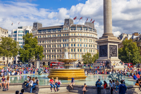 LONDON, UK - August 13, 2014: City view of Trafalgar Square near the National Gallery and the Nelson Statue with lots of tourists and people on a sunny summer dayのeditorial素材