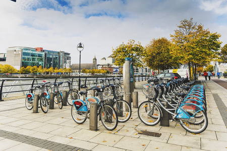 DUBLIN, IRELAND - Septembter 27th, 2016: View over the river Liffey walk featuring autumn coloured...