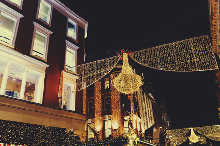 DUBLIN, IRELAND - November 17th, 2016: Detail of busy Grafton Street shopping hub in Dublin city centre with Christmas decorationのeditorial素材