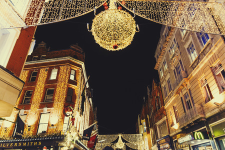 DUBLIN, IRELAND - November 17th, 2016: Detail of busy Grafton Street shopping hub in Dublin city centre with Christmas decorationのeditorial素材