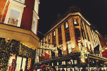 DUBLIN, IRELAND - November 17th, 2016: Detail of busy Grafton Street shopping hub in Dublin city centre with Christmas decorationのeditorial素材