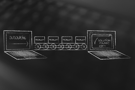 outsourcing IT tasks and problems to technical support: laptop exchanging load of work with anotherの写真素材