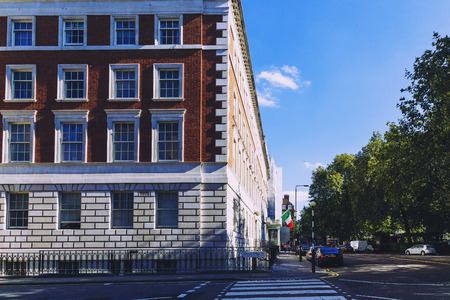 LONDON, UNITED KINGDOM - August 6th, 2016: Detail of beautiful buildings architecture in the streets of London city centre near Grosvenor Square and Duke Streetのeditorial素材