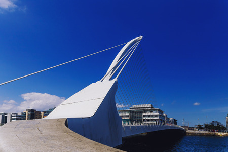 DUBLIN, IRELAND - 12th July, 2017: view over the Liffey river and the Samuel Beckett bridge in Dublinのeditorial素材