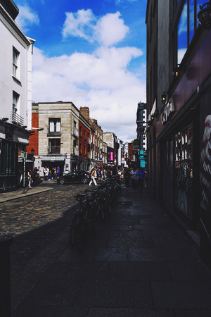 DUBLIN, IRELAND - July 15th , 2017: detail of the pubs and streets in the Temple Bar district in Dublin, Ireland (with unidentified people)のeditorial素材