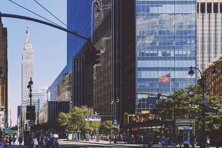 NEW YORK, NY - September 4th, 2017: The eight avenue in Midtown Manhattan and the Empire state building in the distanceのeditorial素材