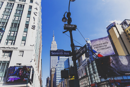 NEW YORK, NY - September 4th, 2017: the Seventh avenue in Manhattan and the Empire State Building in the distanceのeditorial素材
