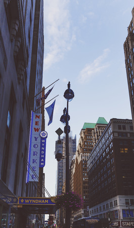 NEW YORK, NY - September 3rd, 2017: Detail of a Midtown street with New Yorker hotel sign and surrounding buildingsのeditorial素材