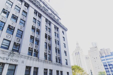 NEW YORK, NEW YORK - September 4th, 2017: Architecture and beautiful buildings in the Manhattan City Hall area in New York on a sunny late summer dayのeditorial素材