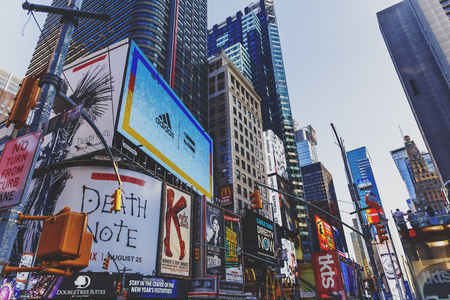 NEW YORK, NEW YORK - September 4th, 2017: detail of busy Times Square in Manhattan, Nyc with plenty of billboards and touristsのeditorial素材